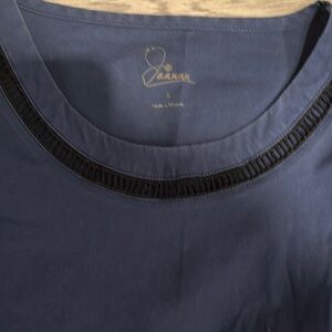 JAANUU  Navy Blue  scrub Top with Black Trim
Slightly faded but super cute